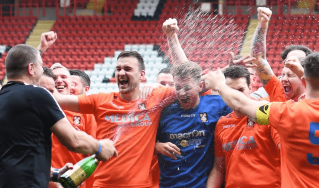 The Battle Town Football Club team celebrating